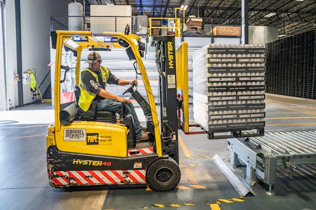 worker using forklift