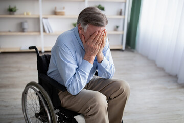 sad man in wheelchair