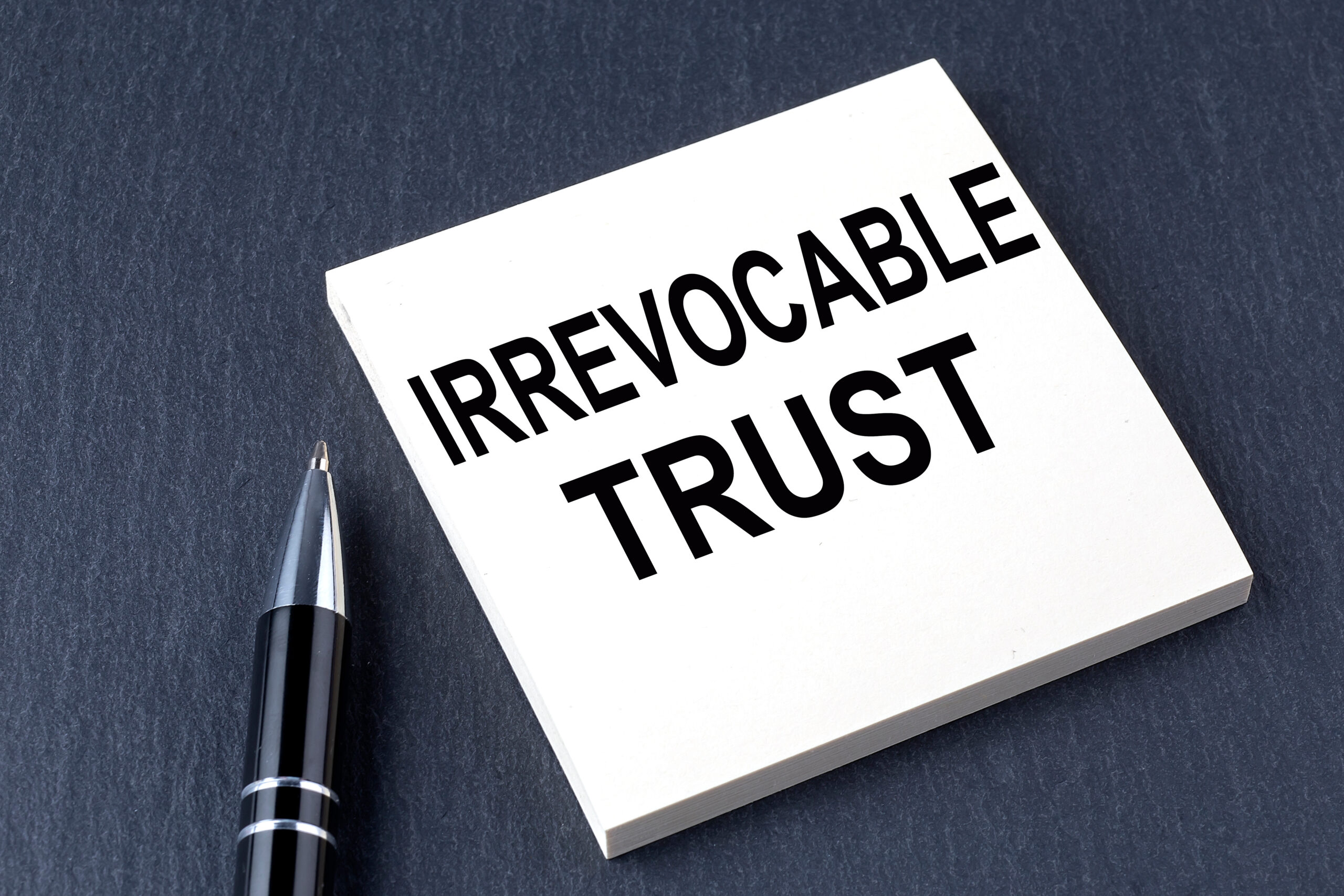 notepad that says irrevocable trust